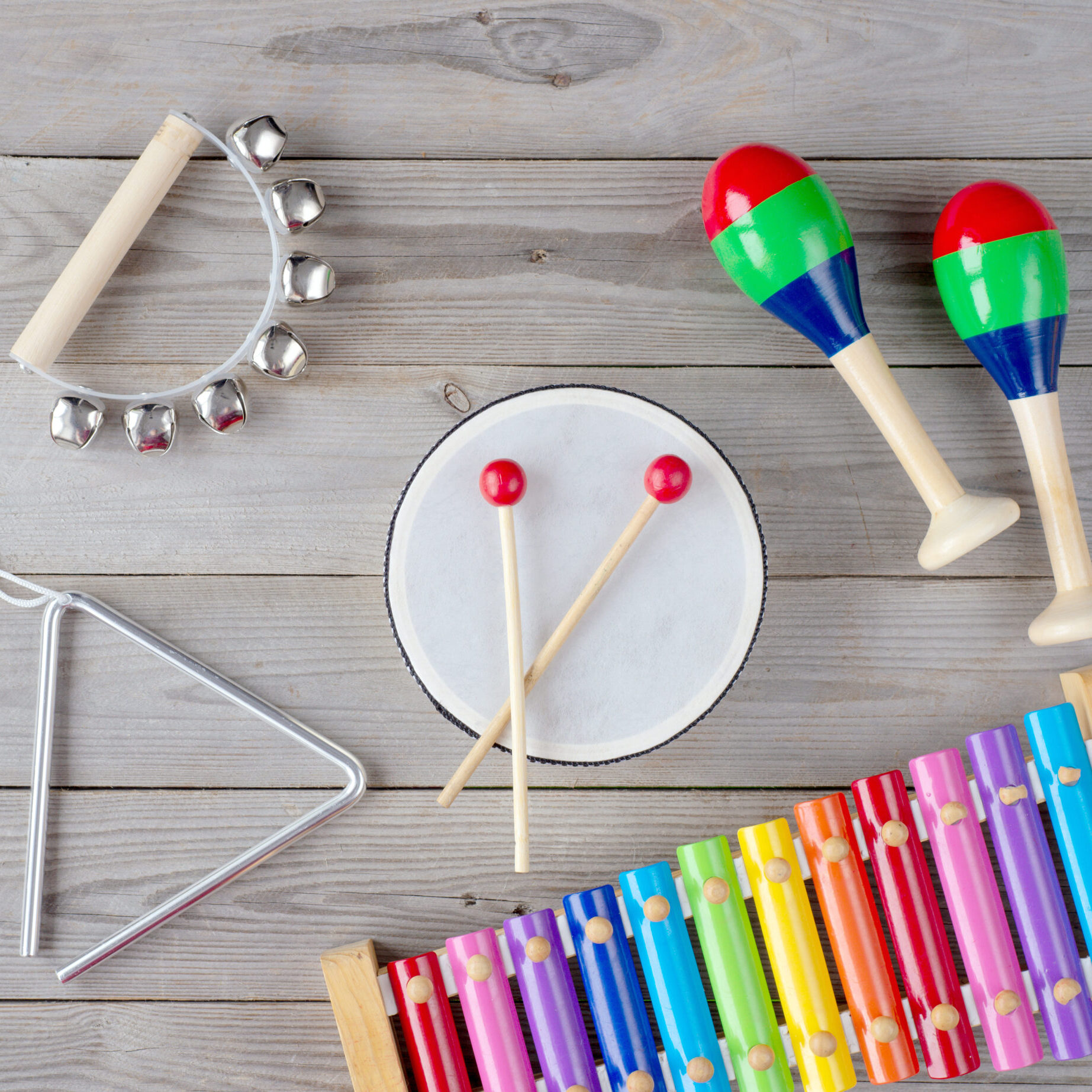 frame made of music accessories for children on white background